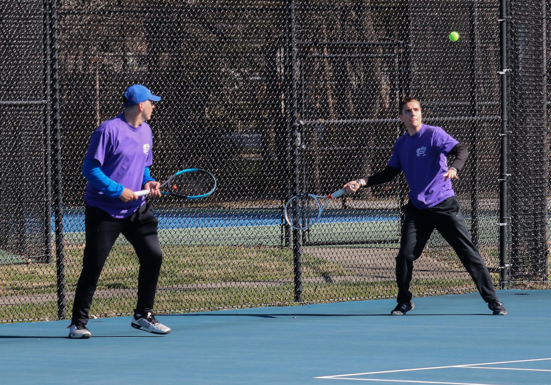 Andrew Ingram (left) and Troy Broska (right) in action at the McCoy Tennis Complex (Photo courtesy of Don Lander).