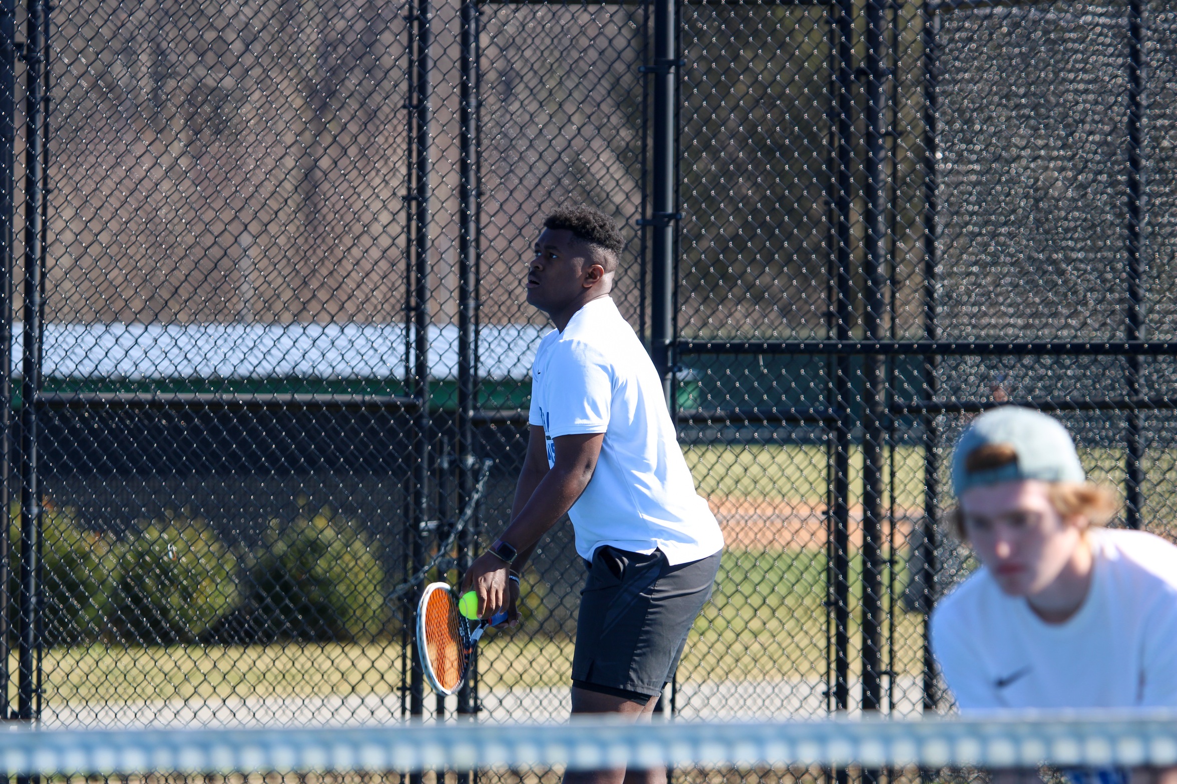 JaMarcus Walker serving up a ball at the McCoy Tennis Complex (Photo courtesy of Brianna Rodibaugh '24).