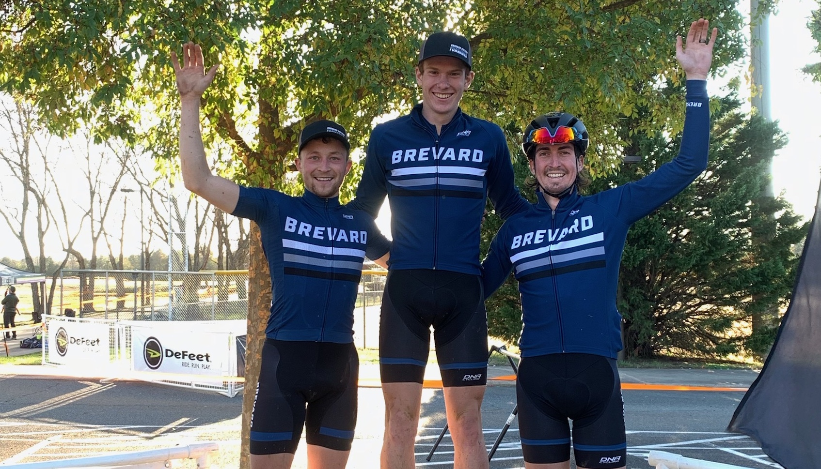 Brevard College student-athletes Tyler Clark (center) and Carson Beckett (left) are joined by BC alum and Assistant Coach Cypress Gorry for a clean podium sweep in the Pro Category 1/2/3 Cyclocross race in Charlotte.