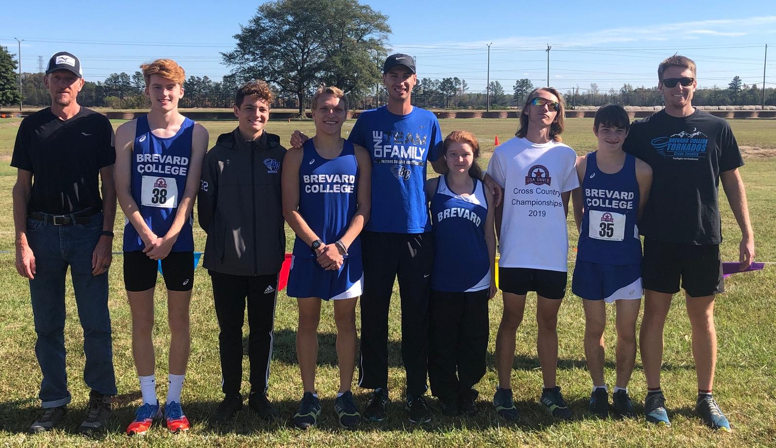 Brevard's representatives at the 2019 USA South Cross Country Championships. Pictured L/R: Volunteer Assistant Coach Chad Newton, Miles Schafer, Dylan Freeman, Solomon Turner, Head Coach Darryll Patrick, Abigail Juul, Gavin Morgan, Michael Fader, & Assistant Coach Jordan Tager.