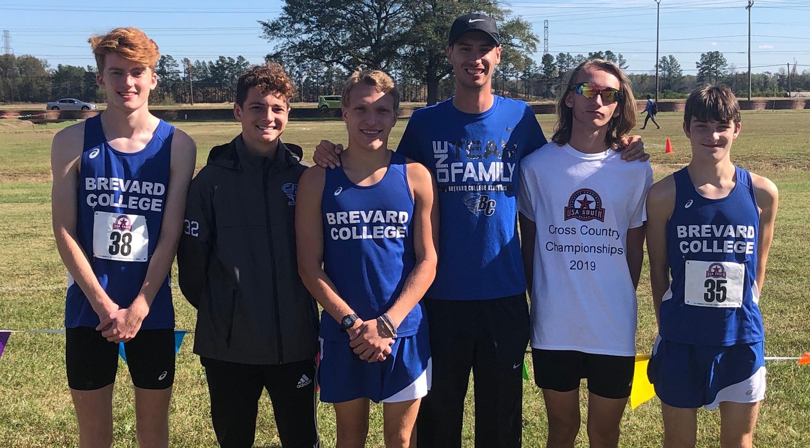 The 2019 BC Men's Cross Country Team, Pictured L/R: Miles Schafer, Dylan Freeman, Solomon Turner, Head Coach Darryll Patrick, All-Conference Second Team Selection Gavin Morgan, and Michael Fader.