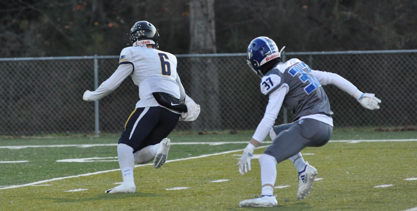Brevard College junior defensive back Wesley Ross chases down Averett quarterback Jacob Wright. Ross sealed BC's hard-fought 10-9 victory with a last-second interception on Averett's final drive (Courtesy of Tommy Moss).