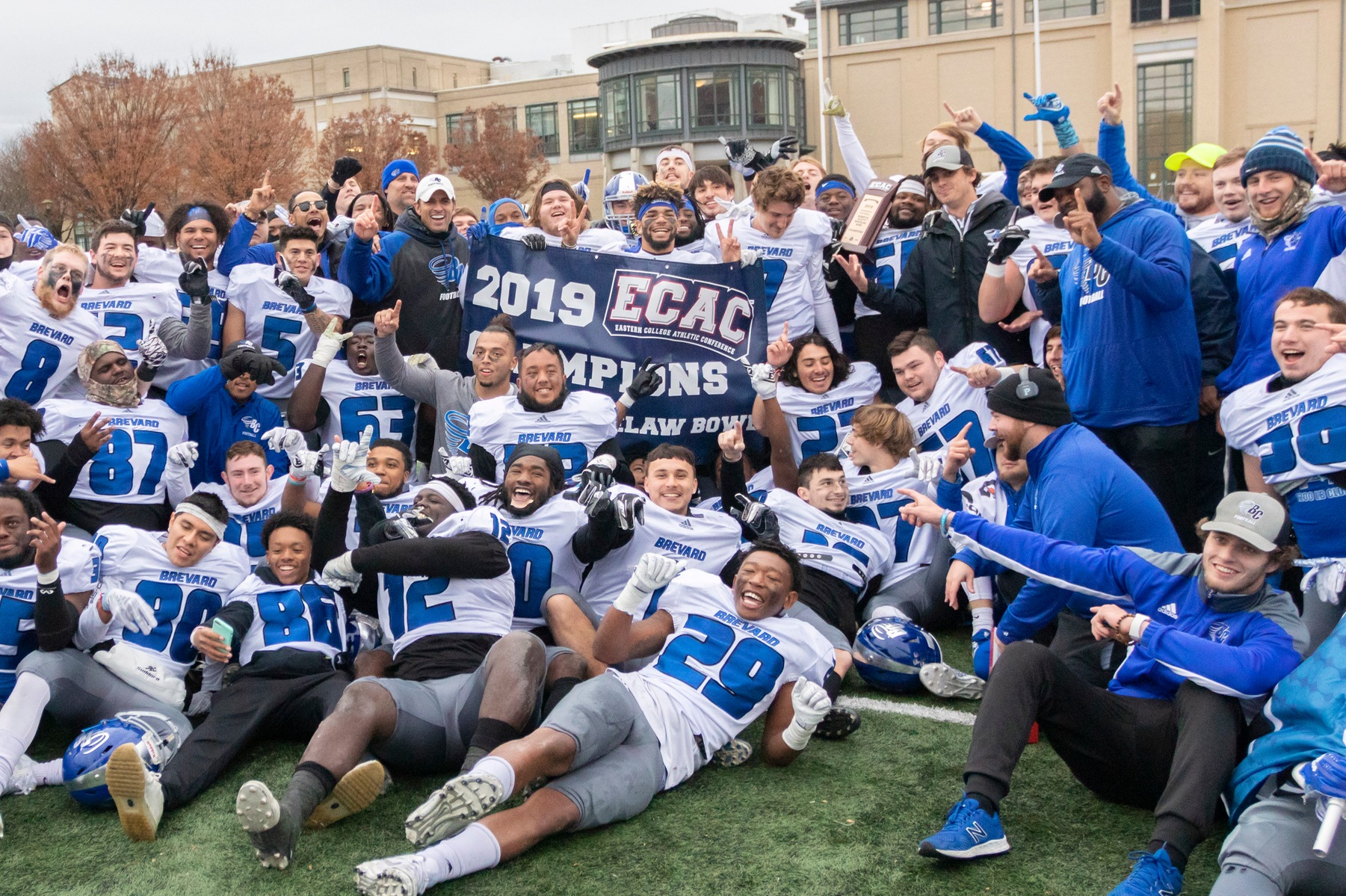 The 2019 Brevard College Football team celebrating its ECAC Scotty Whitelaw Bowl victory in Pittsburgh over Carnegie Mellon University (Photo courtesy of Carnegie Mellon Athletics).