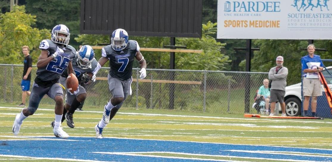 Junior cornerback Quentin Jackson heads towards the end zone. Jackson's 15-yard pick-6 kickstarted Brevard's scoring in its dominant 40-9 victory over Allen (Courtesy of Thom Kennedy '21)