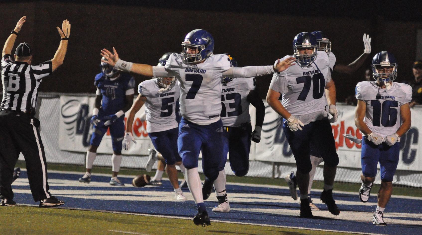 Sophomore quarterback Dalton Cole celebrates a late Tornado touchdown in a 27-6 victory over Christopher Newport on Saturday night at Brevard Memorial Stadium. Cole passed for 181 yards on 10-of-18 passing and a touchdown, while rushing for 100 yards and scoring two touchdowns (Courtesy of Tommy Moss).