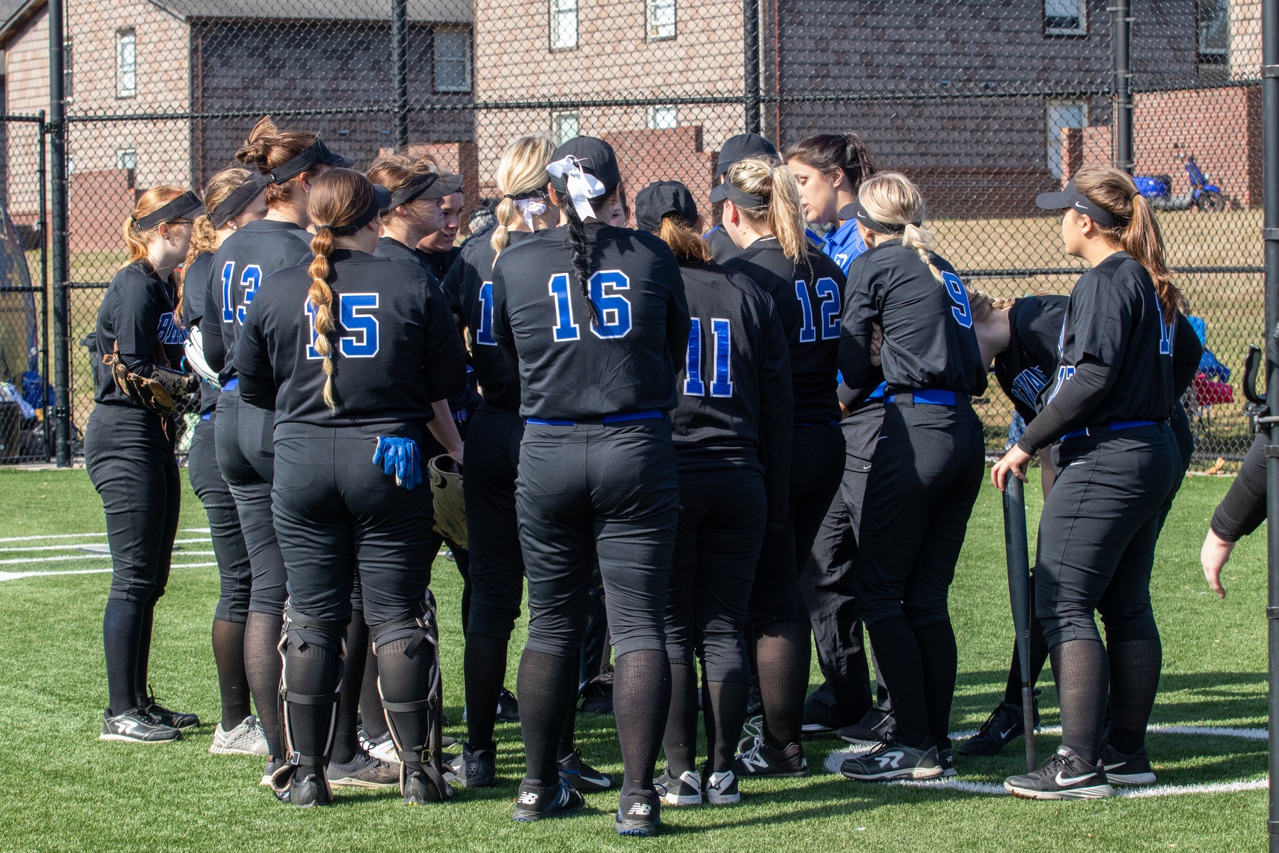 Coach Rohr addresses her team before the game. The first-year Head Coach earned her first-career victory at the helm of the BC softball program on Wednesday (Photo courtesy of Victoria Brayman '22).