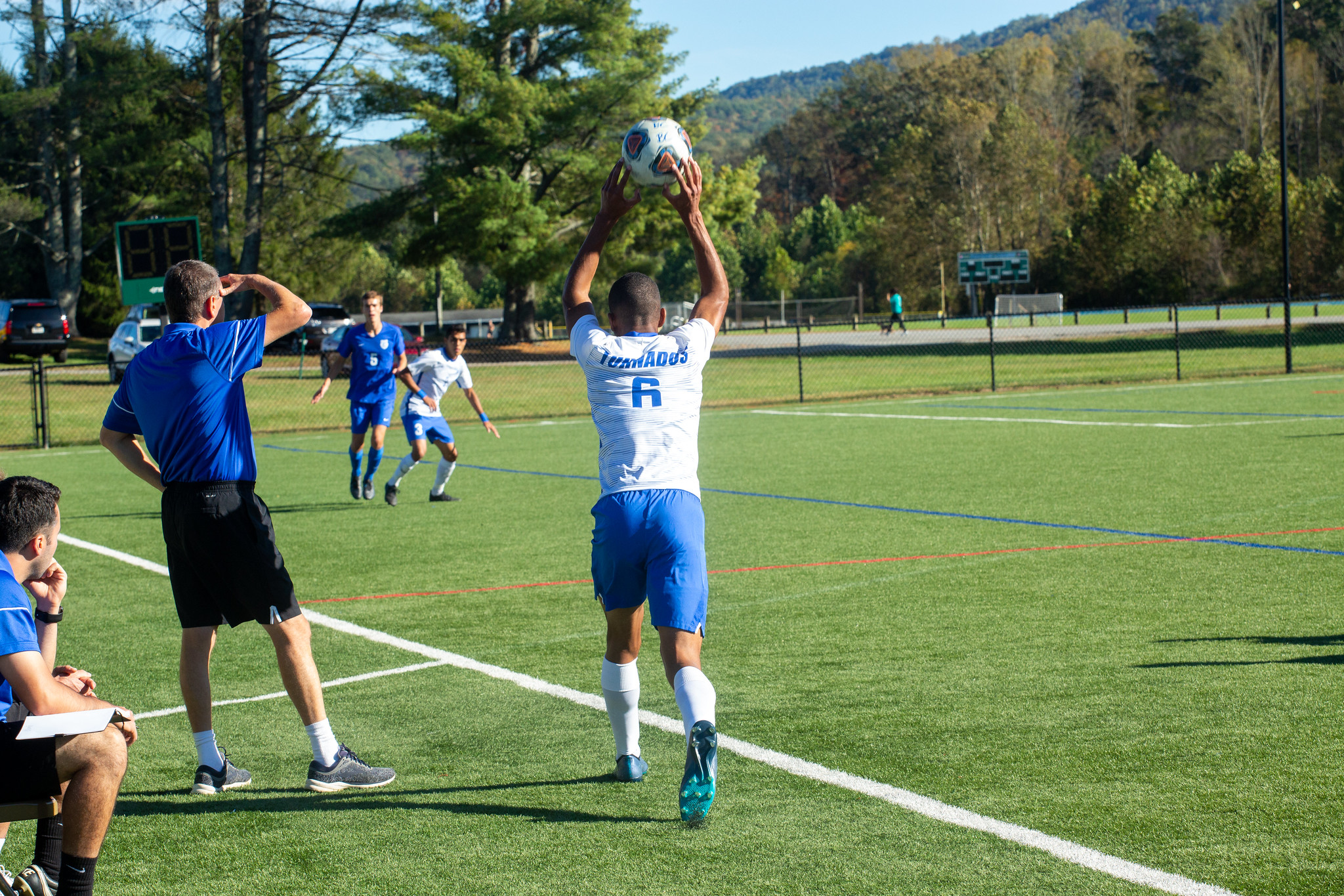 Senior defender Marquis Dickerson attempts a throw-in (Photo courtesy of Victoria Brayman).