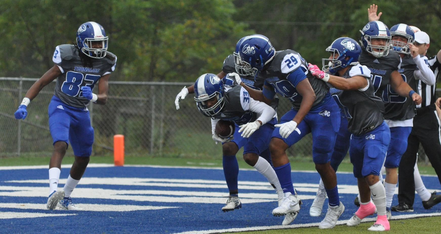 The Brevard College special teams unit celebrates a fumble recovery touchdown in Saturday's 22-10 triumph over Maryville College (Courtesy of Tommy Moss).