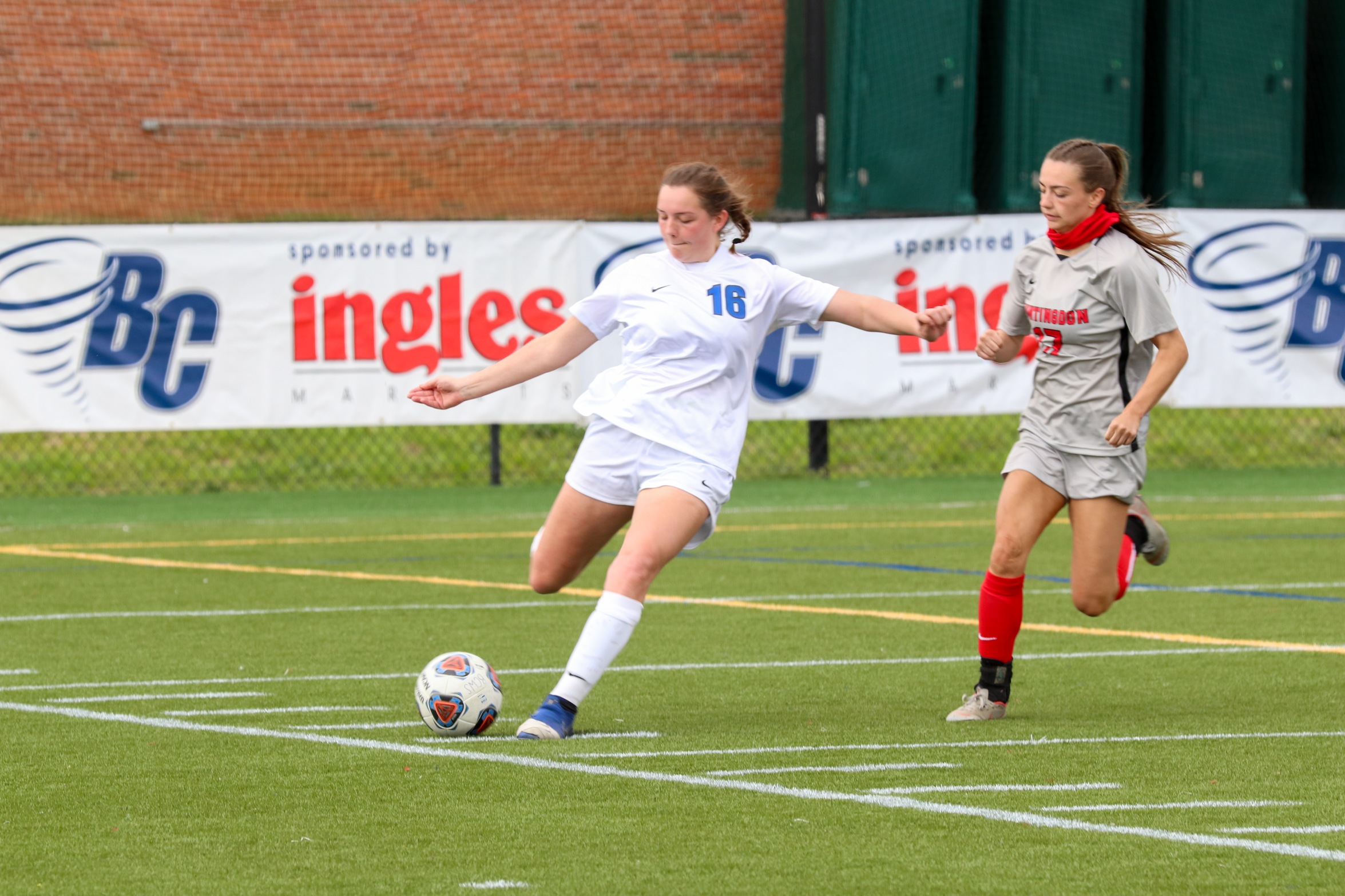 Emma White boots it long at Ives-Lemel Family Field (Photo courtesy of Victoria Brayman '22).