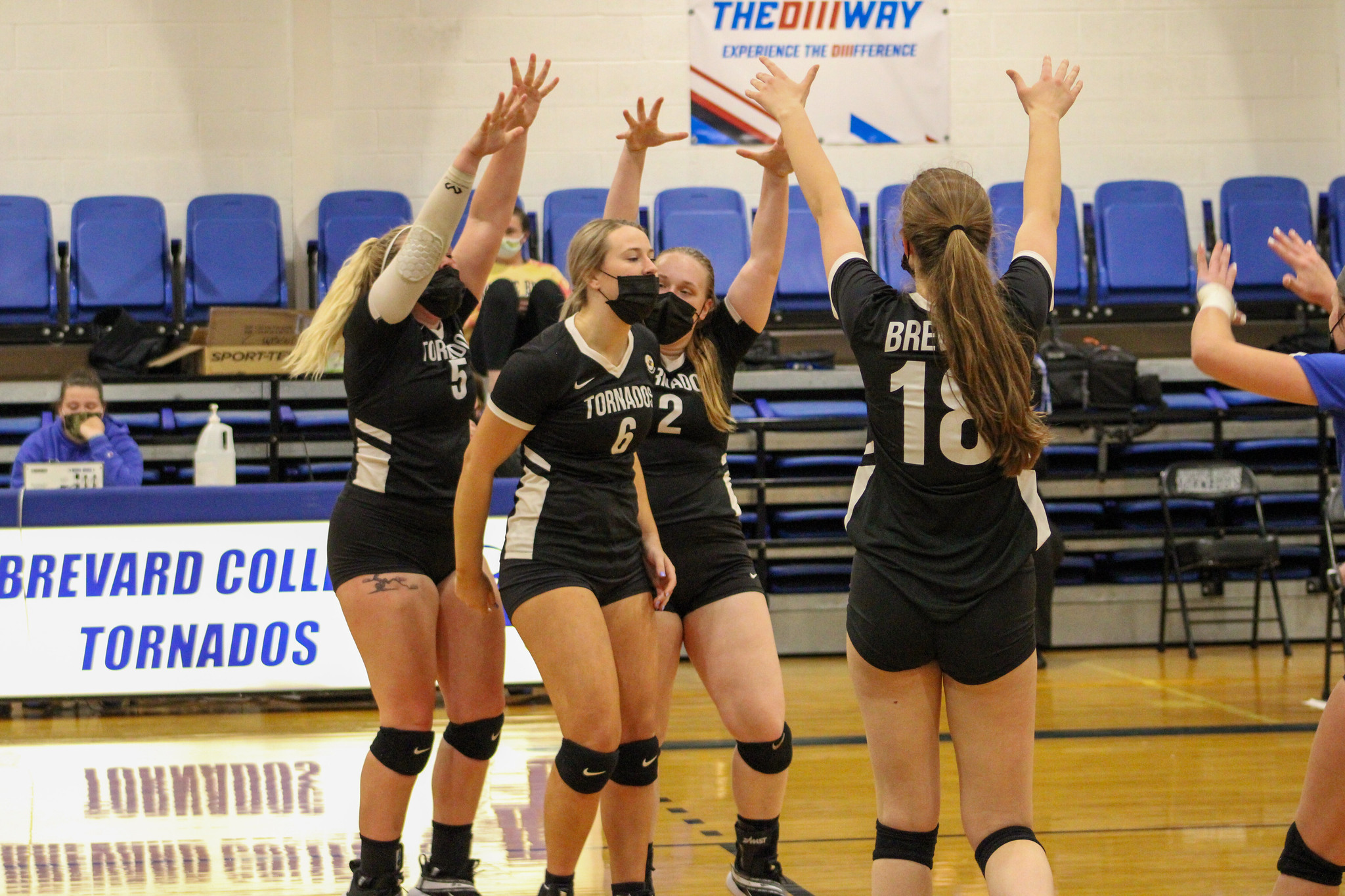 Freshman outside hitter Makenna Parkins surrounded by teammates at The Bosh (Photo courtesy of Brianna Rodibaugh '24).
